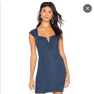 Free people denim dress. New with tags. Size extra small.